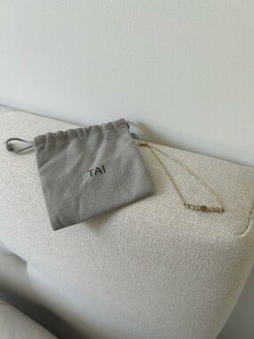 TAI Chain bracelet with multi stone bar. Bolo closure